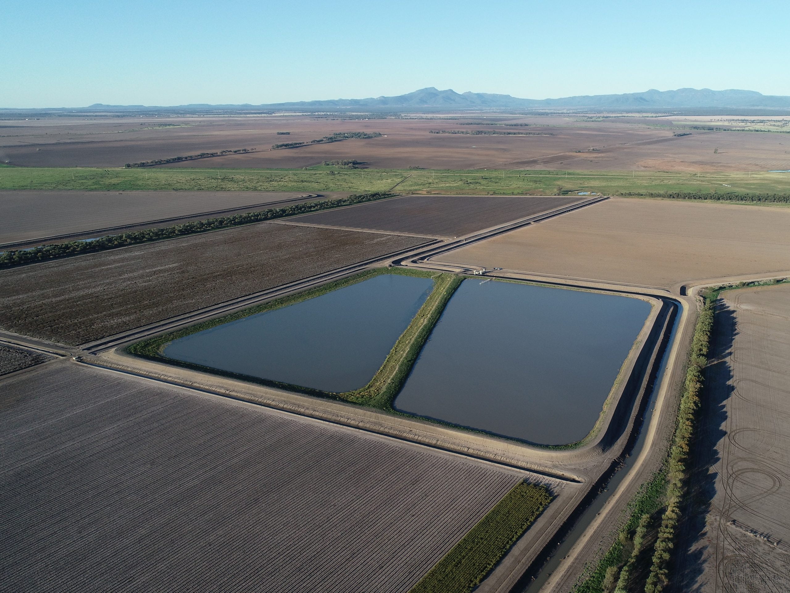 Aerial view of dam water storage facility used for floodplain capacity management in rural NSW